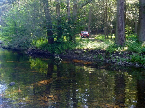 Jeep parked by brookie stream.