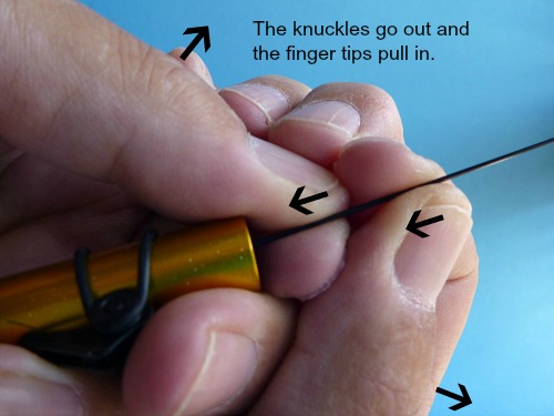 Photo just illustrates the two paragraphs directly above it. Follow those instructions and you will not break the rod.