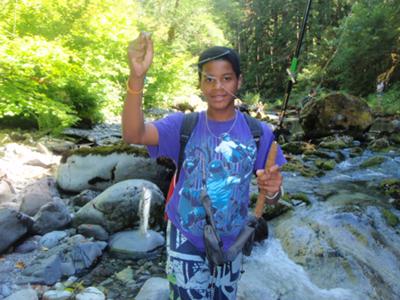 First trout ever! He caught 22 more that week!