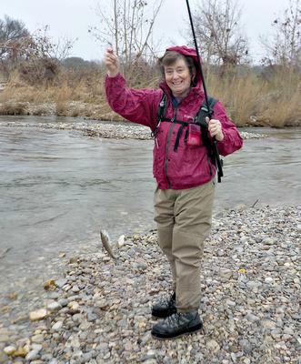 Robin and her Suntech Field Master, the South Llano River, and a Rainbow Trout