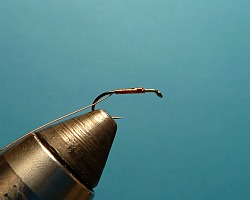 Step 2 Copper wire underwrap from a bit behind the eye to a bit in front of the bend