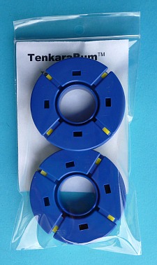 Package of two round blue tenkara line holders.