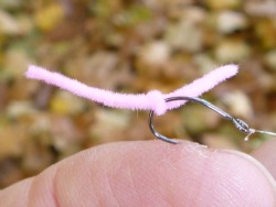 Knot tightened, finished Overhand Worm fly