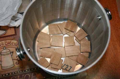 Pail with cardboard squares in the bottom