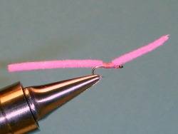Finished Pink Chenille Worm in the vise
