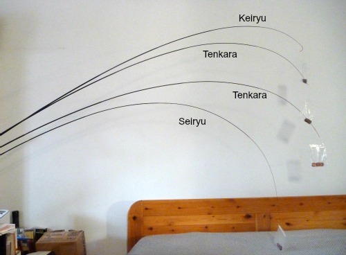 Bend profiles: Keiryu rod at top of photo, two tenkara rods, seiryu rod at bottom