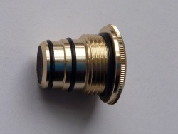 Grip screw cap removed from rod, showing the rubber O rings that hold the zooming sections securely.