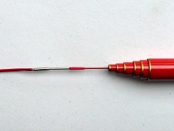 Tenryu Furaibo rod tip, showing lillian attached with an in-line swivel.