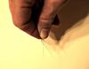 Shaping and snipping the first feather can be tricky