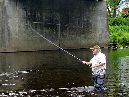 Fred K demonstrating two-handed cast.