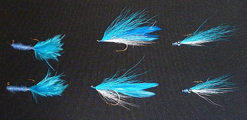 Photo of six blue or blue and white streamers and bucktails
