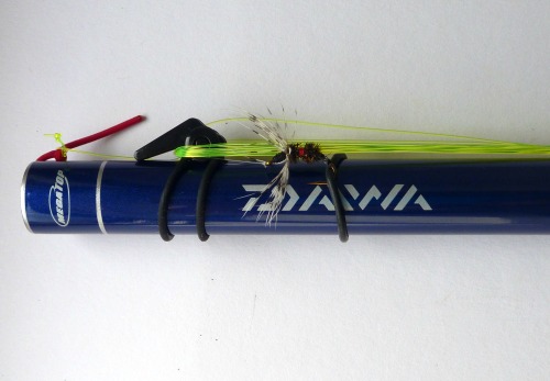 Fuji EZ Keepers holding line and fly on a keiryu rod