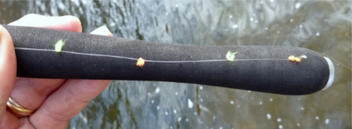 Yarn marker knots on heavy clear tenkara lne