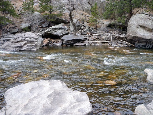 River in Colorado with large bank eddy on the far side