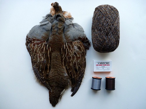 Partridge skin, yarn, gray and brown thread.